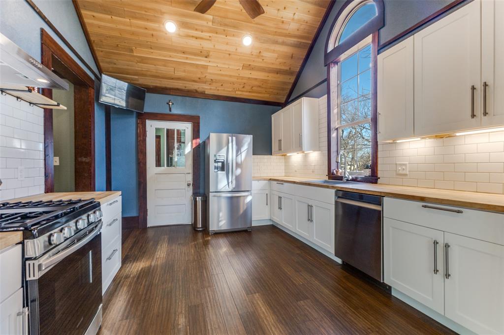 112 Elm Street Howe, TX 75459 - Photo 12 of 26 New cabinetry, vinyl flooring
