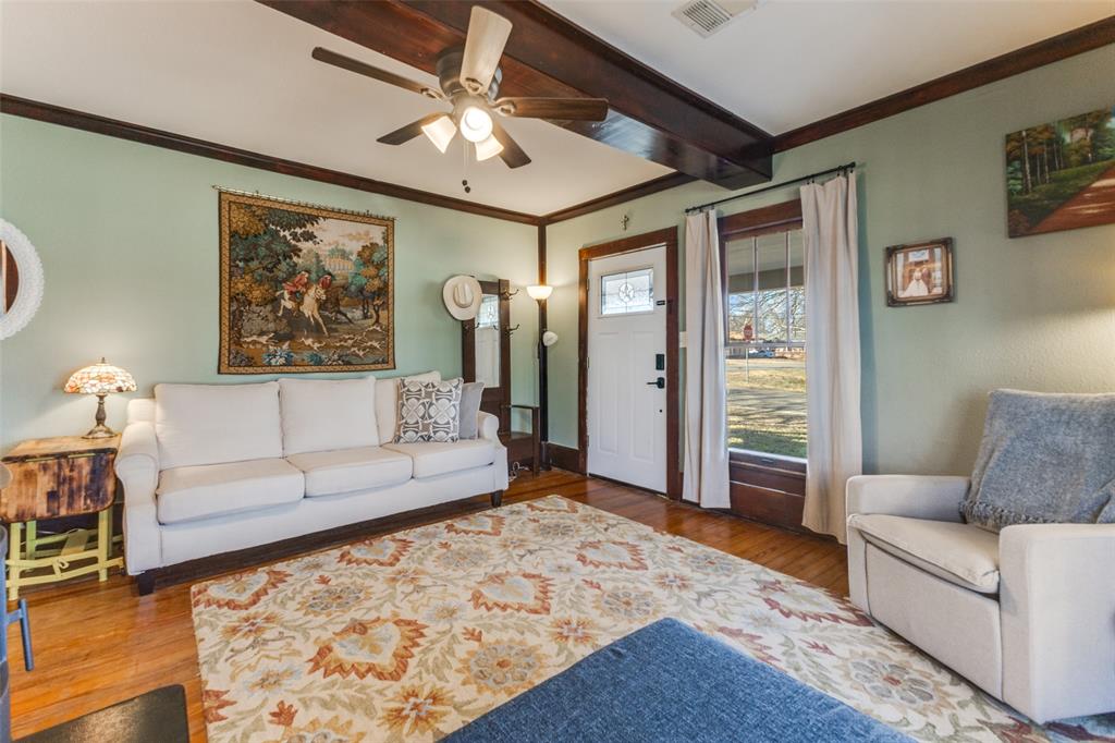 112 Elm Street Howe, TX 75459 - Photo 6 of 26 Original hardwoods in living room