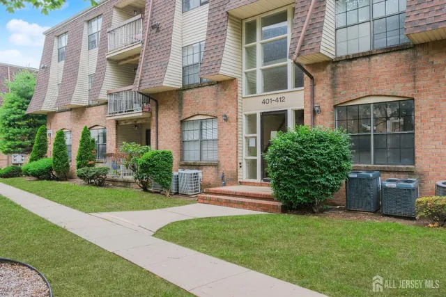 a view of a building with a garden