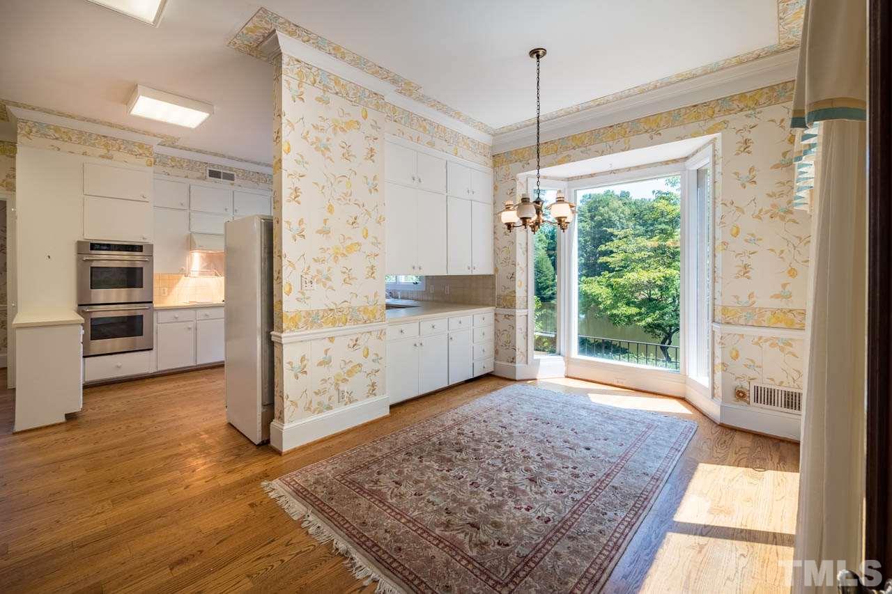 3210 Sussex Road Raleigh, NC 27612 - Photo 11 of 29 a view of a hallway with furniture and a window