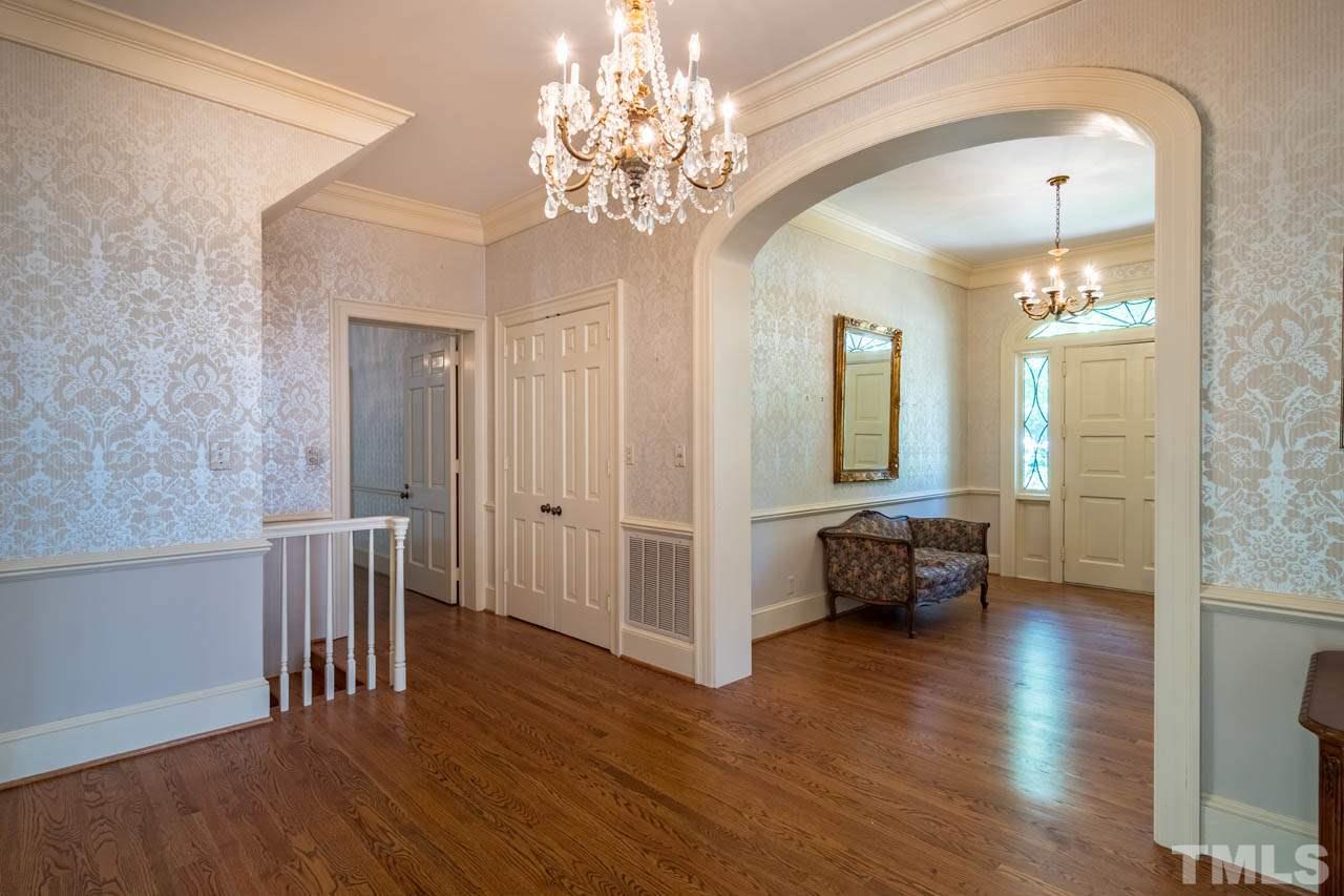3210 Sussex Road Raleigh, NC 27612 - Photo 13 of 29 a view of a livingroom with furniture and wooden floor