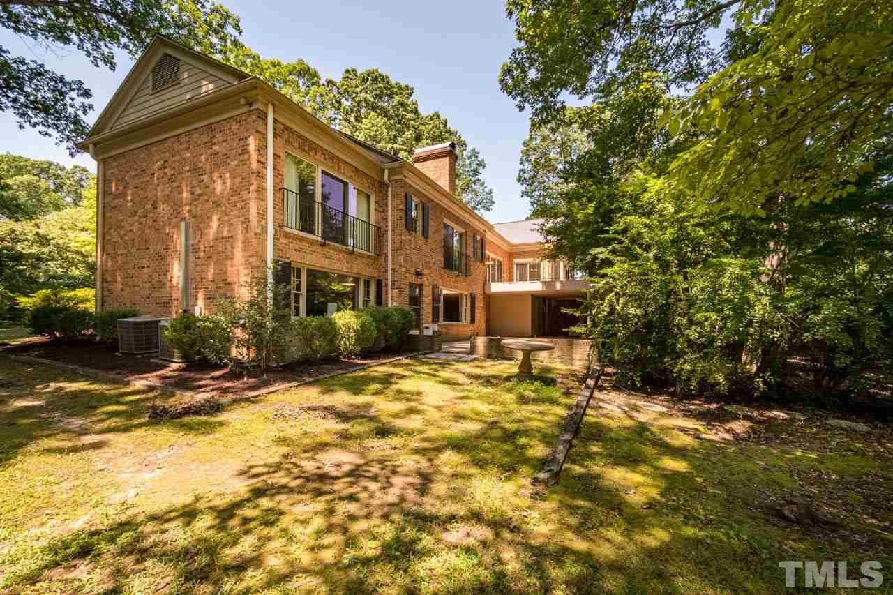 3210 Sussex Road Raleigh, NC 27612 - Photo 29 of 29 a view of a house with a yard