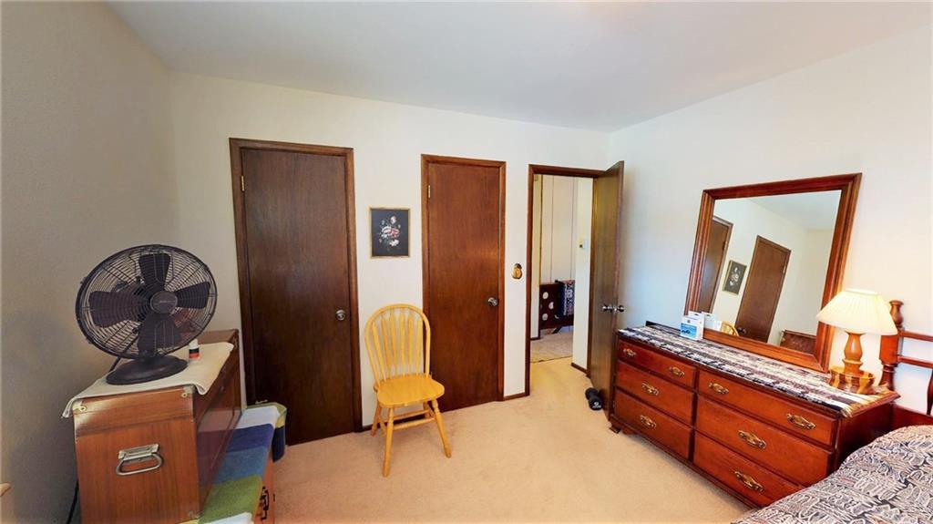 170 Evergreen Road, Unit 305 Dillon, CO 80435 - Photo 16 of 22 a living room with furniture and a mirror