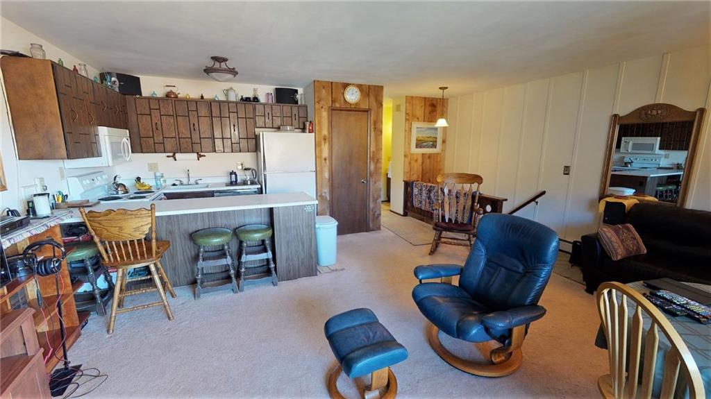 170 Evergreen Road, Unit 305 Dillon, CO 80435 - Photo 5 of 22 a living room with furniture and a large window