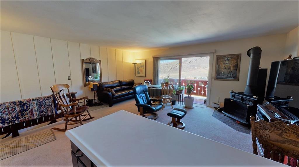 170 Evergreen Road, Unit 305 Dillon, CO 80435 - Photo 8 of 22 a living room with furniture a window and gym equipment