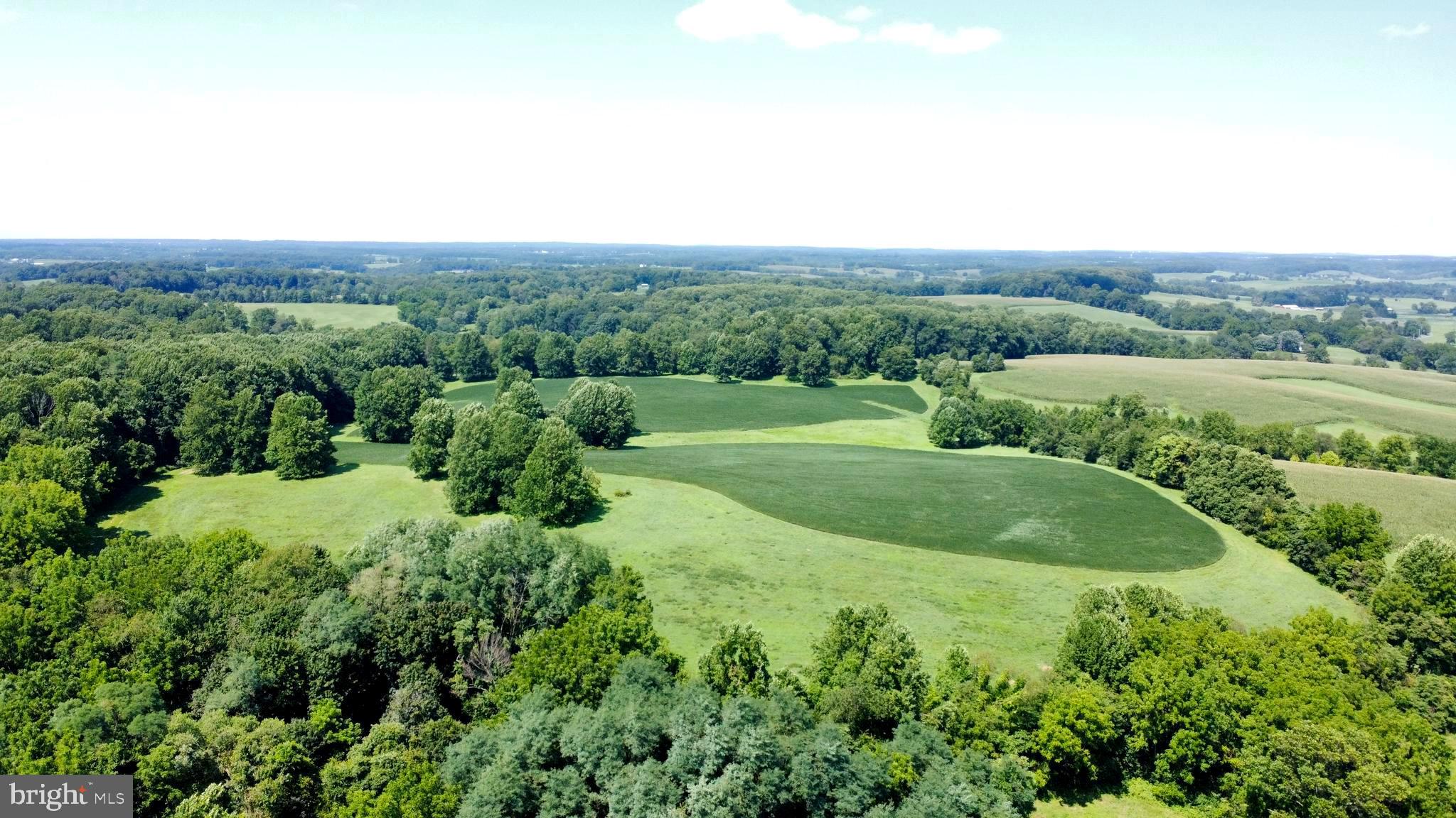 120 Funk Road Cochranville, PA 19330 - Photo 5 of 20 an aerial view of green landscape with trees