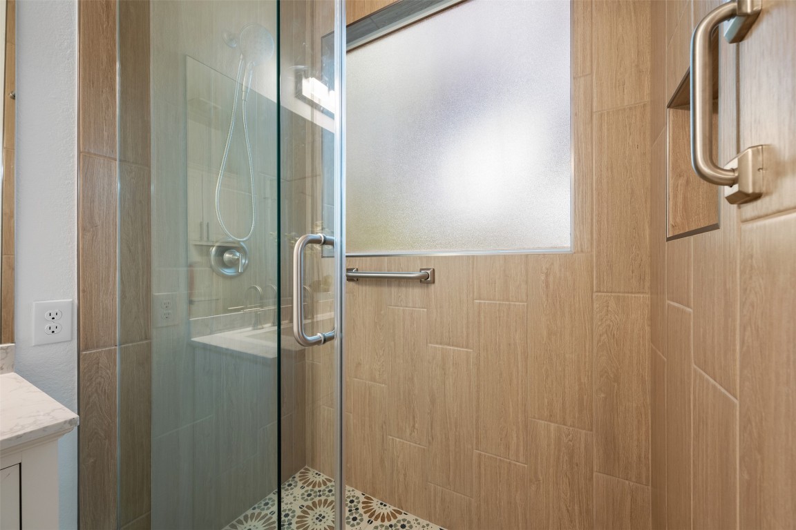 11000 Anderson Mill Road, Unit 63 Austin, TX 78750 - Photo 23 of 40 a bathroom with a shower