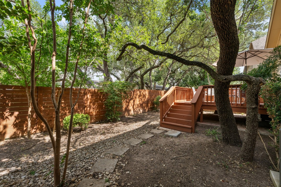 11000 Anderson Mill Road, Unit 63 Austin, TX 78750 - Photo 34 of 40 a view of a bench in a backyard