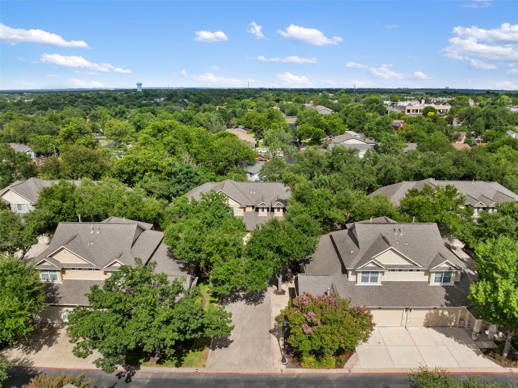 11000 Anderson Mill Road, Unit 63 Austin, TX 78750 - Photo 39 of 40 an aerial view of residential houses with outdoor space and street view