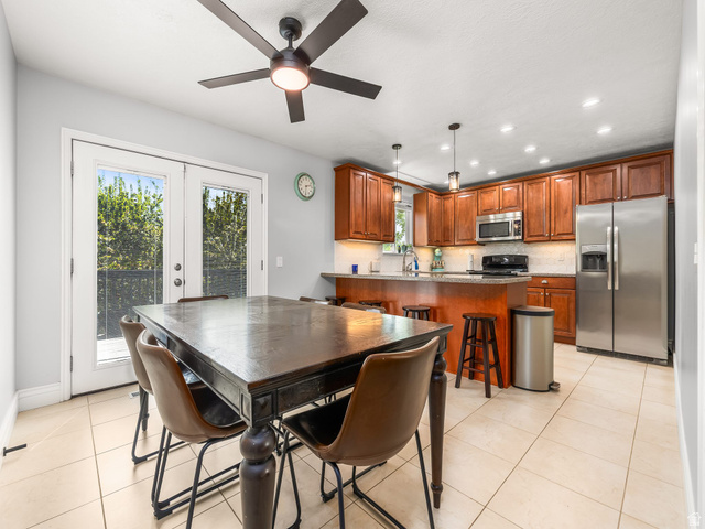523 Mountain View Road Centerville, UT 84014 - Photo 5 of 33 Dining area with recessed lighting, a ceiling fan, light tile patterned floors, and french doors