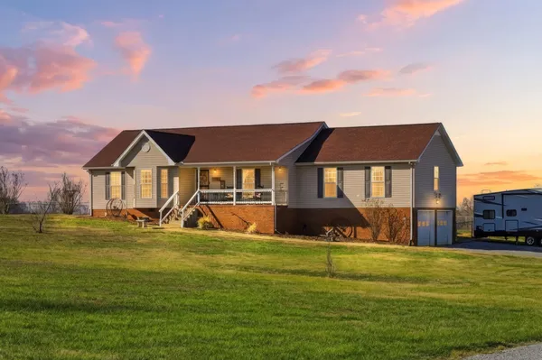a view of a house with a big yard