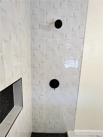 a kitchen with a cabinets and white appliances