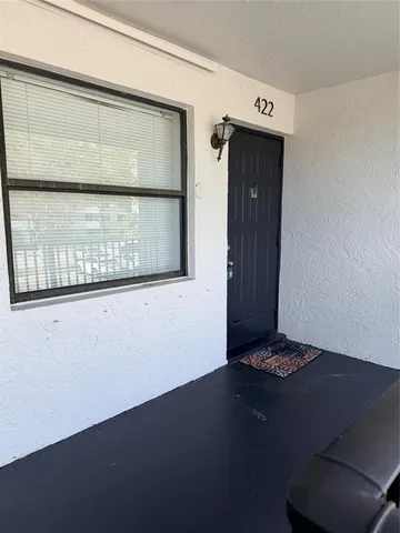 a kitchen with a refrigerator stove and microwave