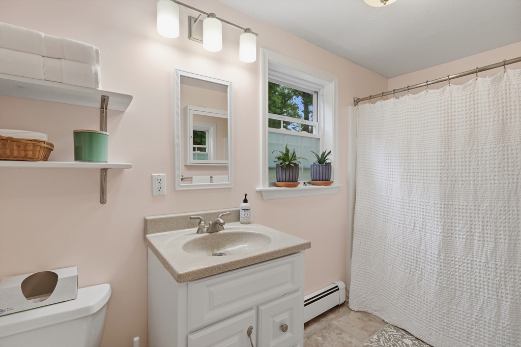 60 Petersham Road Phillipston, MA 01331 - Photo 17 of 33 a bathroom with a sink toilet and mirror