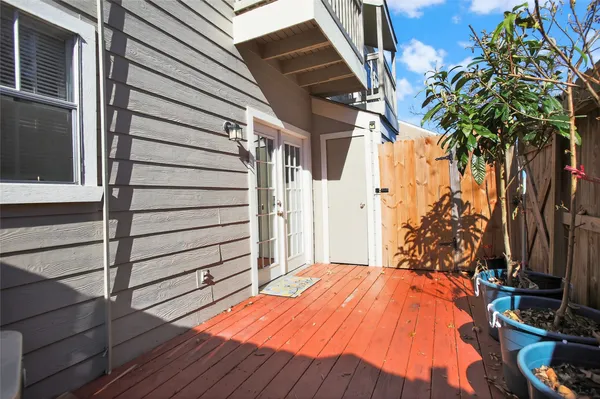 a bed sitting in front of a house