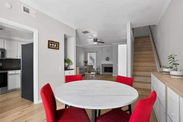a view of a dining room with furniture