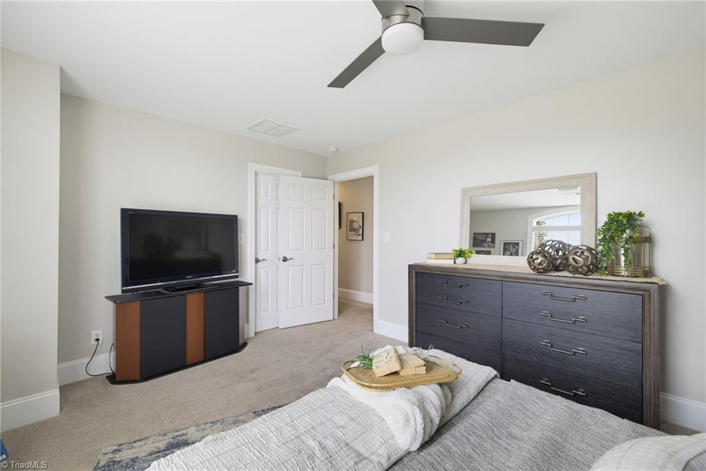 5411 Effieham Street Oak Ridge, NC 27310 - Photo 24 of 49 Spacious Bedroom 3 with large closet