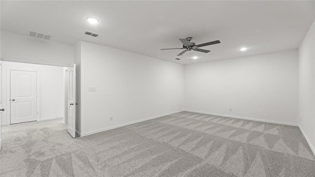 3809 Paradise Way Sherman, TX 75090 - Photo 8 of 16 an empty room with fan and a ceiling fan