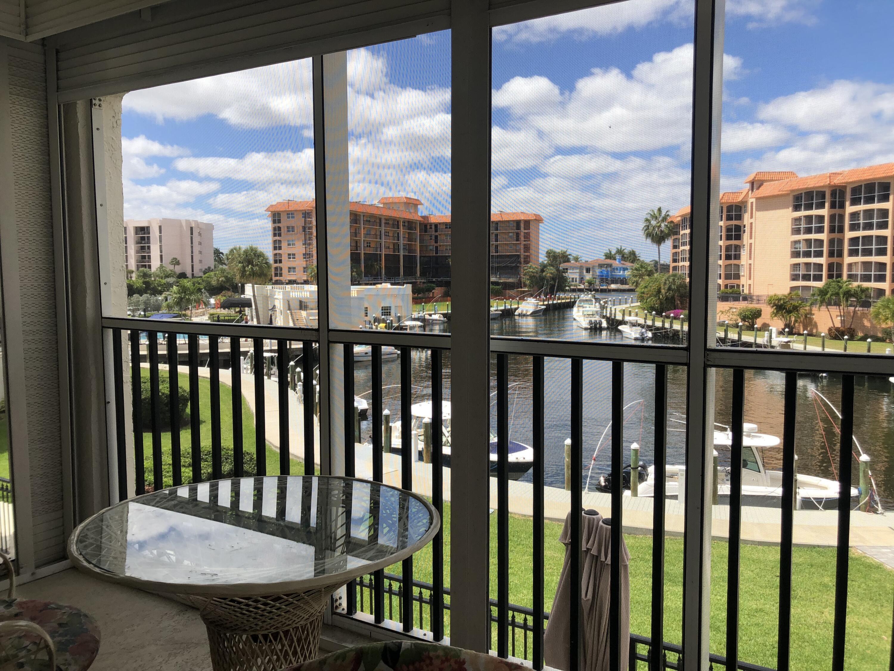2871 North Ocean Boulevard, Unit M226 Boca Raton, FL 33431 - Photo 14 of 45 a view of a city from a balcony