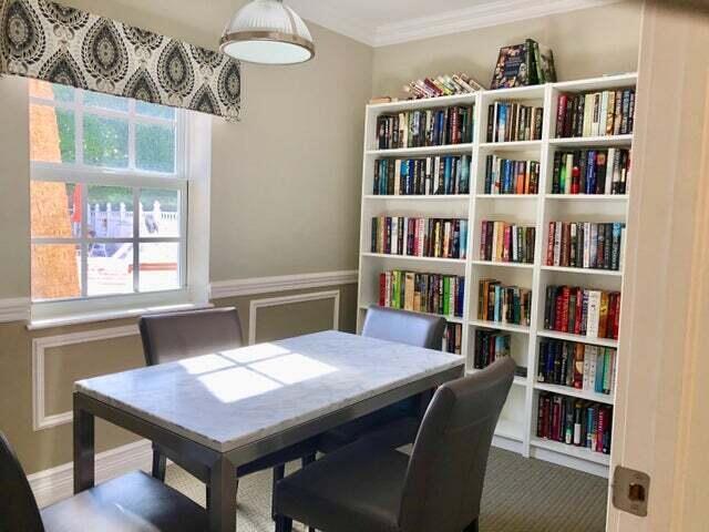 2871 North Ocean Boulevard, Unit M226 Boca Raton, FL 33431 - Photo 29 of 45 a view of a room with a book shelf