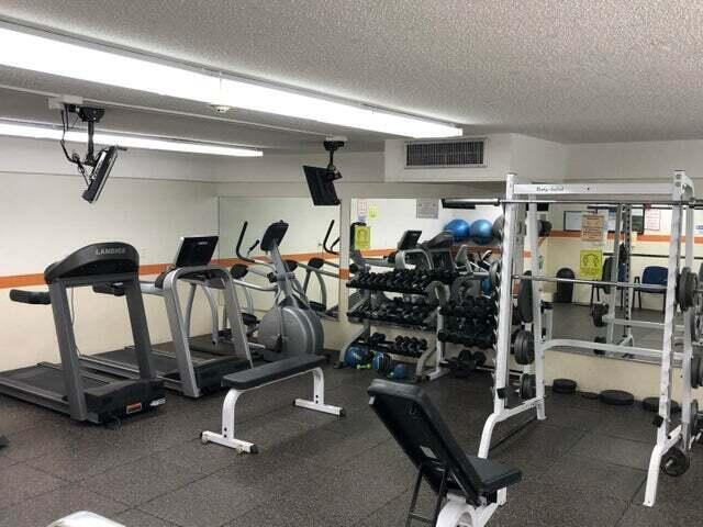 2871 North Ocean Boulevard, Unit M226 Boca Raton, FL 33431 - Photo 31 of 45 a view of a room with gym equipment