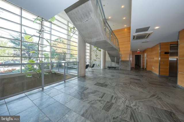 a view of an entryway with a lot of shelves