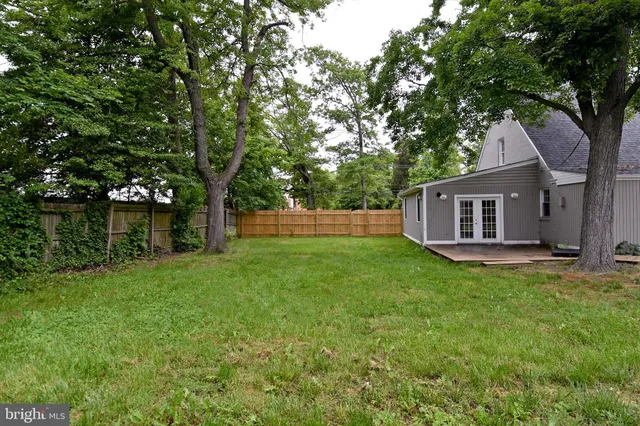 a backyard of a house with seating space