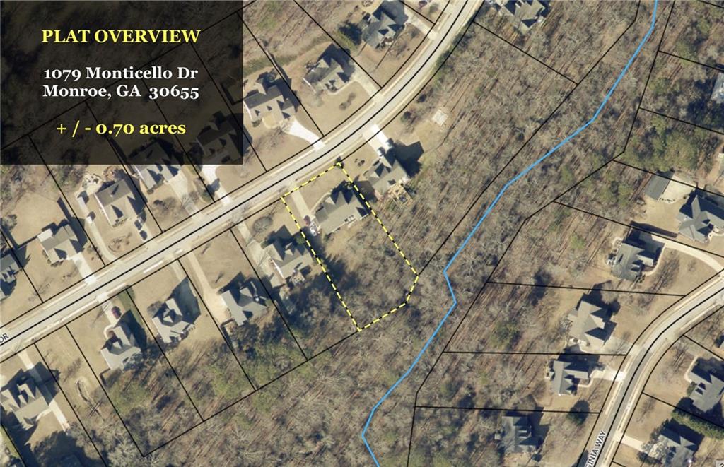 1079 Monticello Drive Monroe, GA 30655 - Photo 2 of 57 a close up of a street sign