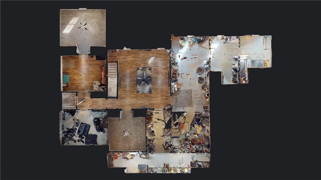 1079 Monticello Drive Monroe, GA 30655 - Photo 33 of 57 view of water heater room with wooden floor