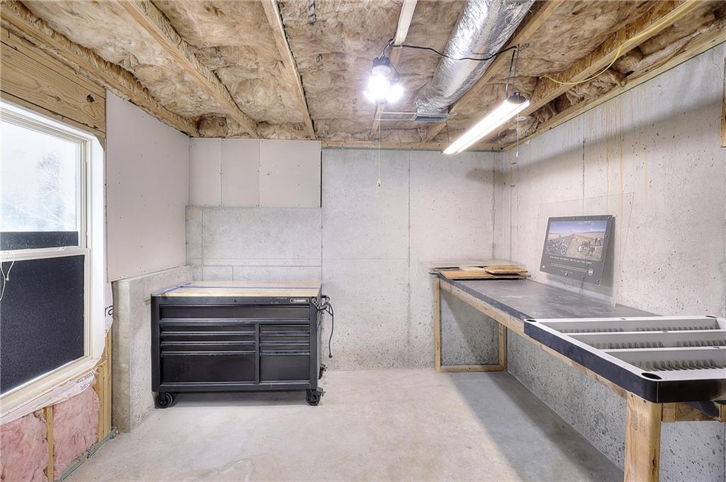 1079 Monticello Drive Monroe, GA 30655 - Photo 37 of 57 a kitchen with stainless steel appliances granite countertop a stove and a refrigerator