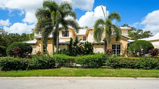 a patio with a yard patio and outdoor seating