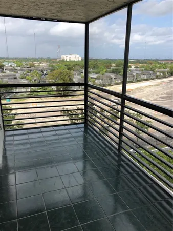 a view of a balcony with lake view and the ocean view