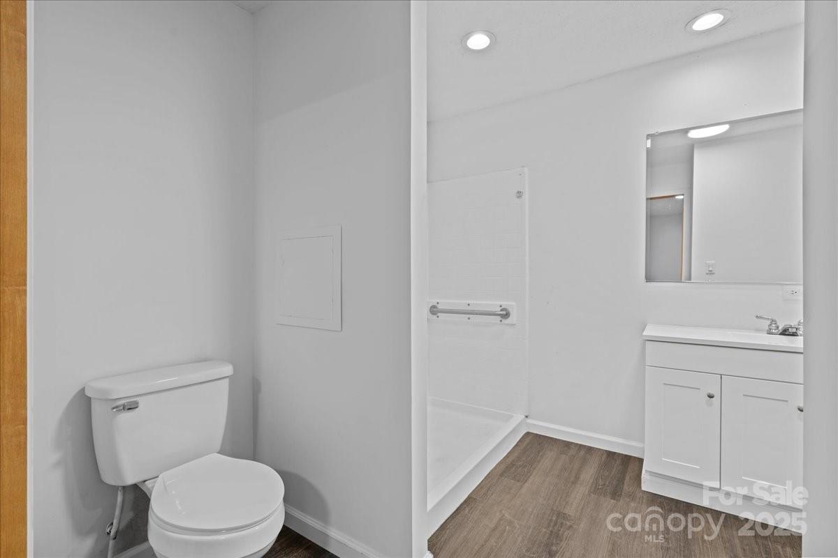 282 Bob Hardin Road Rutherfordton, NC 28139 - Photo 13 of 27 a bathroom with a toilet and a sink