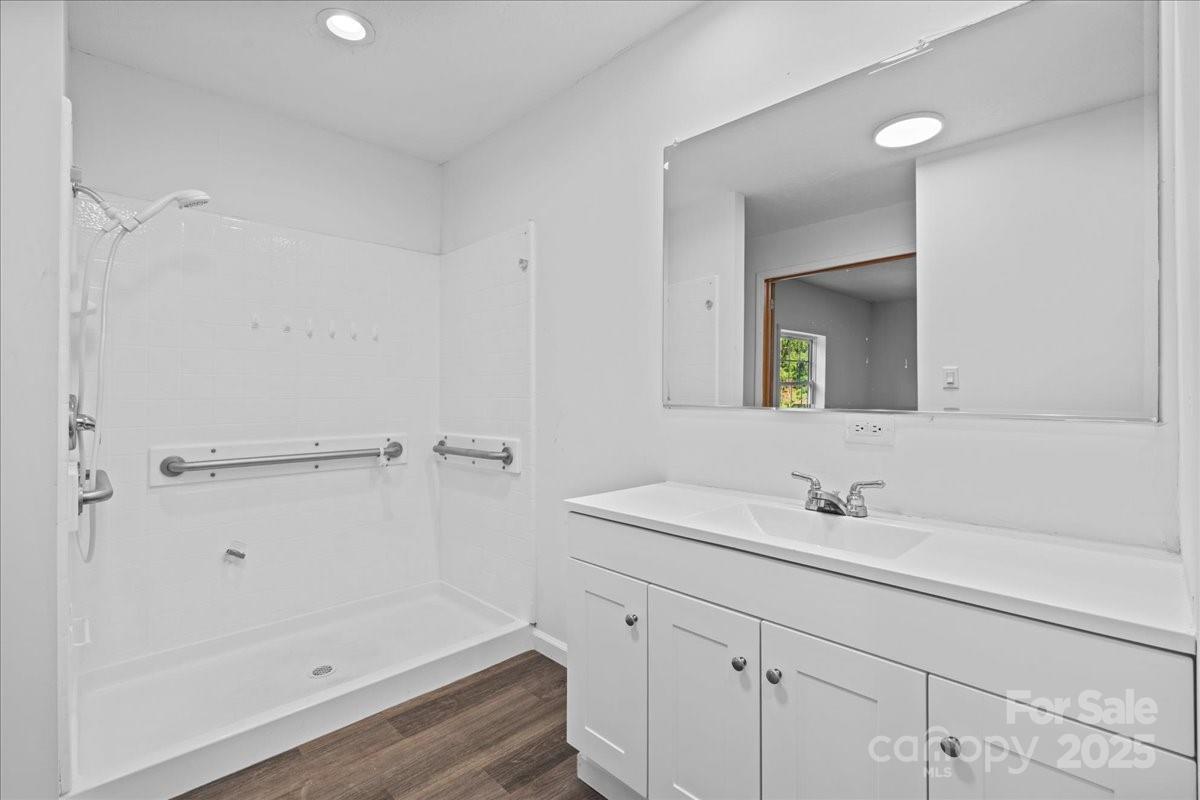 282 Bob Hardin Road Rutherfordton, NC 28139 - Photo 14 of 27 a bathroom with a sink and a mirror