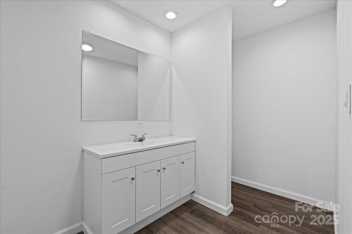 282 Bob Hardin Road Rutherfordton, NC 28139 - Photo 15 of 27 a bathroom with a sink and a mirror