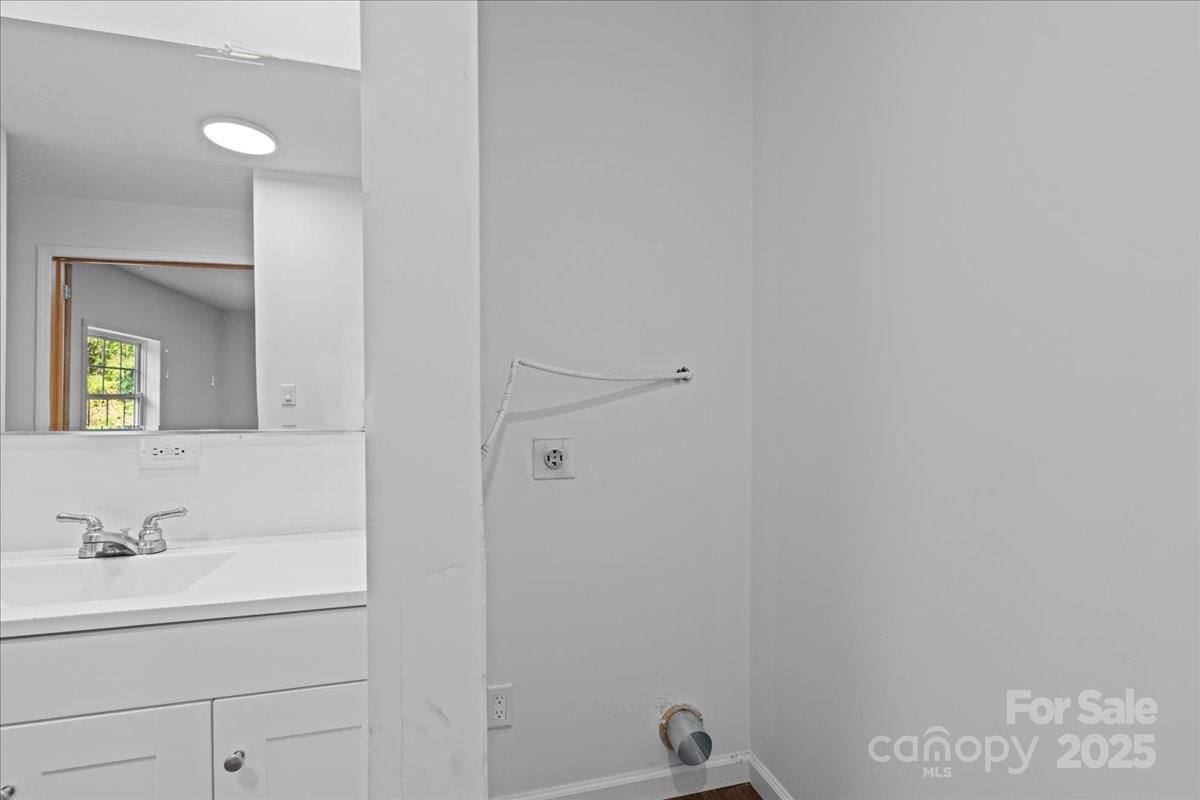 282 Bob Hardin Road Rutherfordton, NC 28139 - Photo 16 of 27 a bathroom with a sink and a mirror