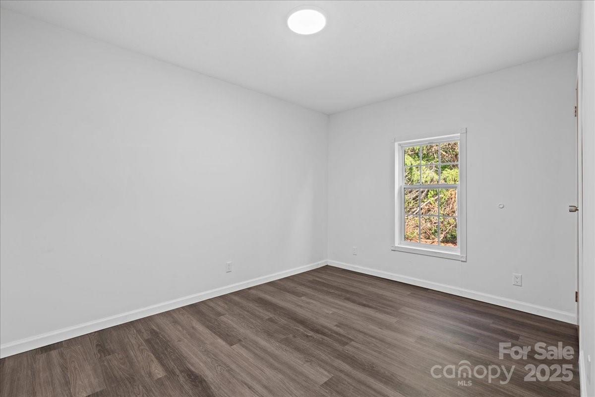 282 Bob Hardin Road Rutherfordton, NC 28139 - Photo 19 of 27 an empty room with a window