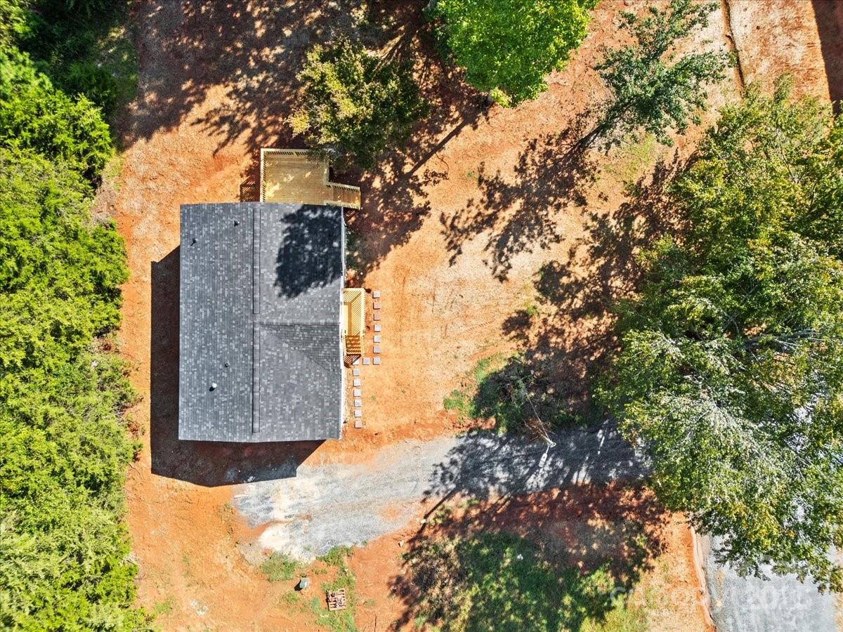 282 Bob Hardin Road Rutherfordton, NC 28139 - Photo 24 of 27 a wooden fence with a tree in the background