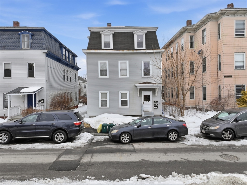 15 Goulding Street Worcester, MA 01609 - Photo 2 of 16 a cars parked in front of a house