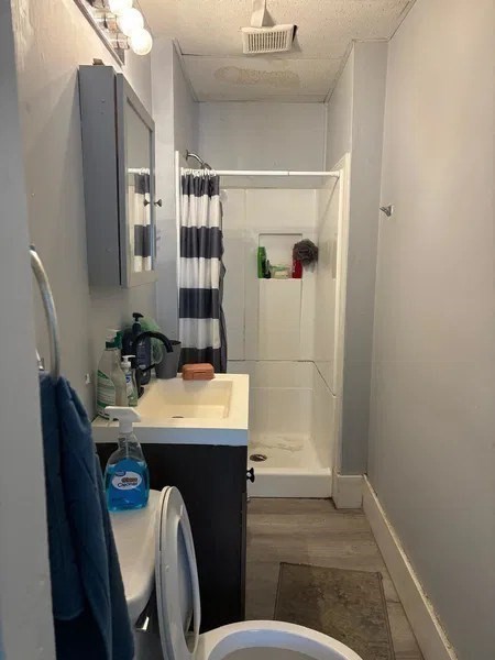 15 Goulding Street Worcester, MA 01609 - Photo 9 of 16 a bathroom with a sink a toilet and shower