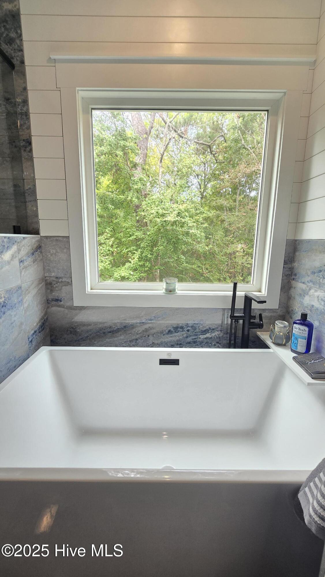 2659 Seashore Road Southwest Supply, NC 28462 - Photo 28 of 75 Soaking Tub overlooking stream and forest