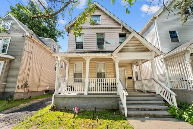 a view of front of a house with a porch