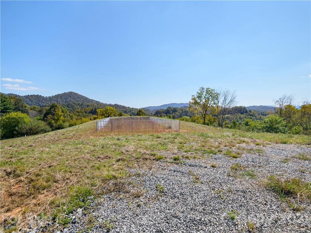 354 Sandy Bottom Road Marshall, NC 28753 - Photo 3 of 12 a view of an outdoor space and a yard