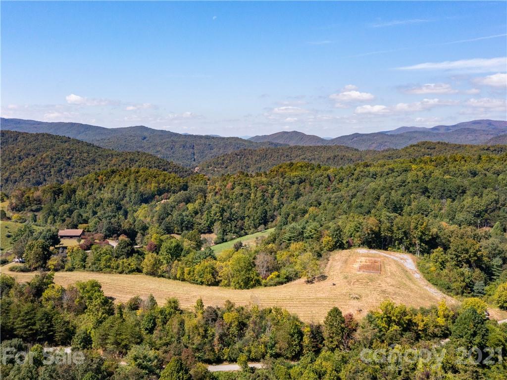 354 Sandy Bottom Road Marshall, NC 28753 - Photo 10 of 12 a view of a city with a mountain in the background
