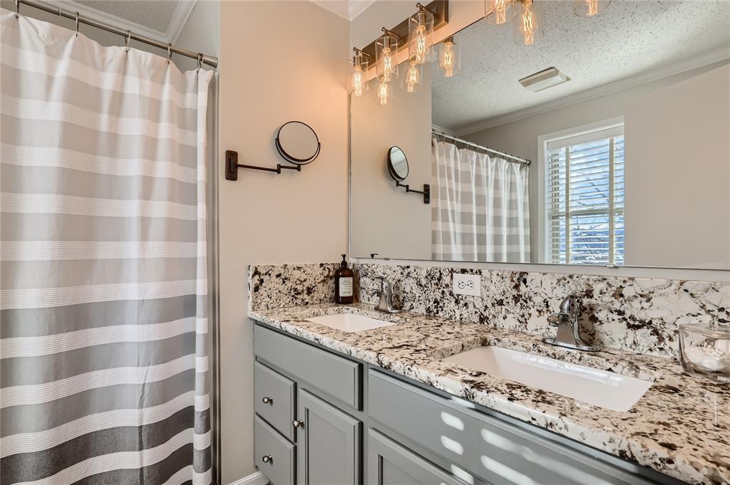 263 Saddle Ridge Drive, Unit 263 Silverthorne, CO 80498 - Photo 15 of 25 a bathroom with a bathtub and a sink