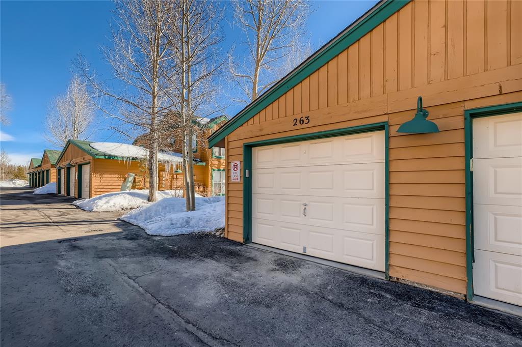 263 Saddle Ridge Drive, Unit 263 Silverthorne, CO 80498 - Photo 24 of 25 a view of a house with a garage