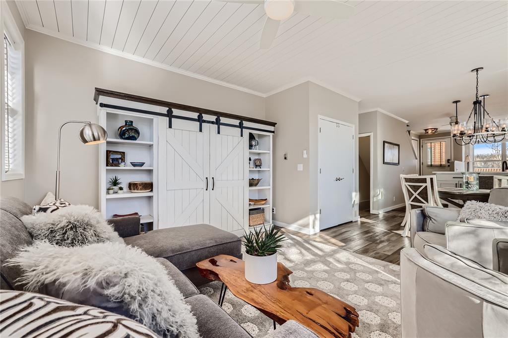 263 Saddle Ridge Drive, Unit 263 Silverthorne, CO 80498 - Photo 5 of 25 a bedroom with two beds and a large mirror
