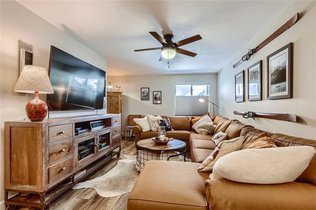 263 Saddle Ridge Drive, Unit 263 Silverthorne, CO 80498 - Photo 10 of 25 a living room with furniture and a window
