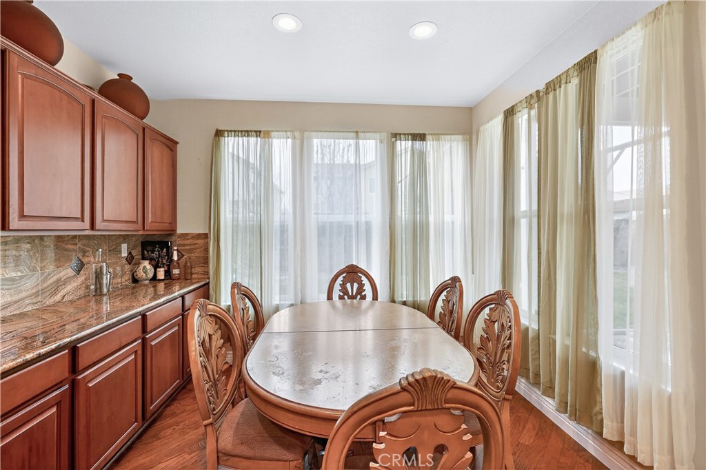 1277 Baxter Drive Merced, CA 95348 - Photo 17 of 63 a view of a kitchen area with furniture and staircase