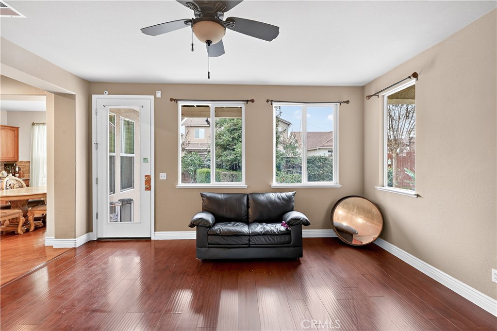 1277 Baxter Drive Merced, CA 95348 - Photo 21 of 63 a living room with furniture and a large window